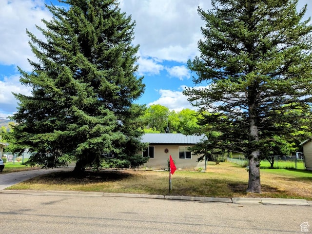 674 N 6th St, Montpelier, ID 83254 - view of front of property featuring a front lawn