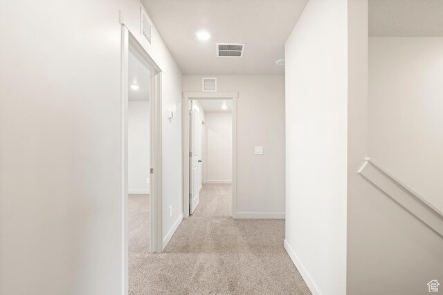 1264 N Berra Blvd Unit 133, Tooele, UT 84074 - hall with baseboards, light colored carpet, recessed lighting, and visible vents