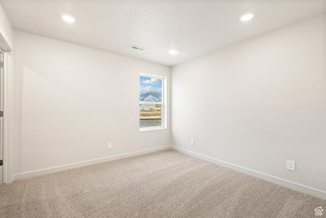 1264 N Berra Blvd Unit 133, Tooele, UT 84074 - carpeted spare room with visible vents, recessed lighting, and baseboards