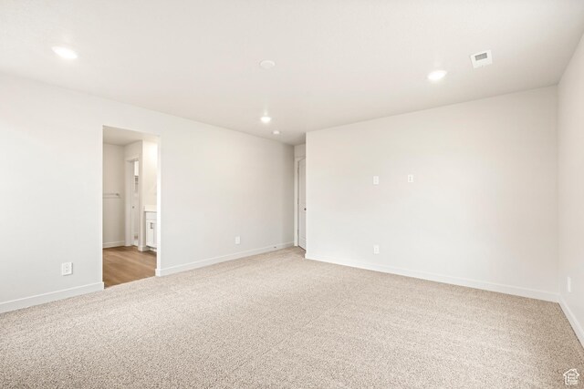 1264 N Berra Blvd Unit 133, Tooele, UT 84074 - unfurnished room with recessed lighting, baseboards, light colored carpet, and visible vents