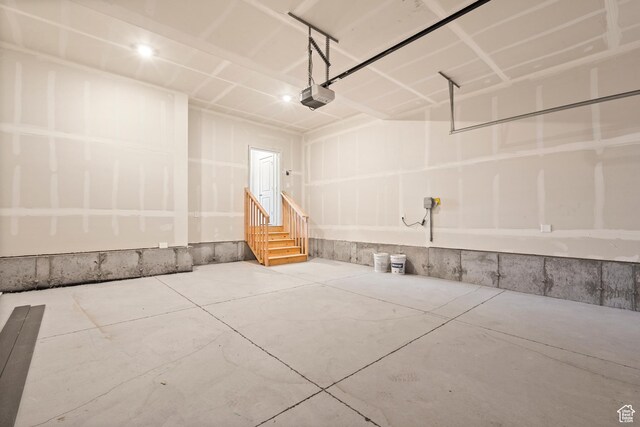 1264 N Berra Blvd Unit 133, Tooele, UT 84074 - garage with a garage door opener