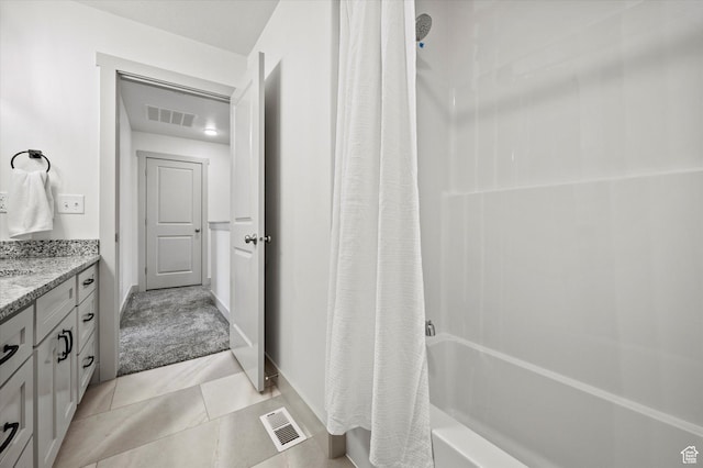658 S 85 E Unit 13, Smithfield, UT 84335 - bathroom featuring shower / bath combination with curtain, vanity, baseboards, and tile patterned floors