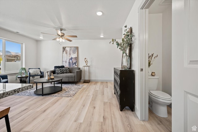 658 S 85 E Unit 13, Smithfield, UT 84335 - living room featuring light wood finished floors, ceiling fan, and recessed lighting