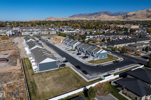 658 S 85 E Unit 13, Smithfield, UT 84335 - aerial view of property's location featuring a mountain backdrop and nearby suburban area
