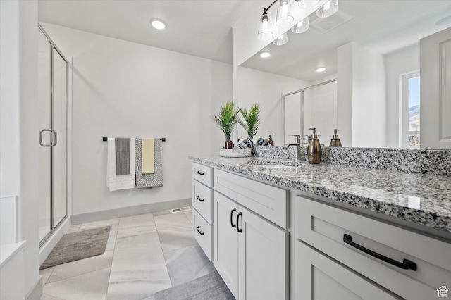 658 S 85 E Unit 13, Smithfield, UT 84335 - bathroom with a shower stall, vanity, recessed lighting, and baseboards