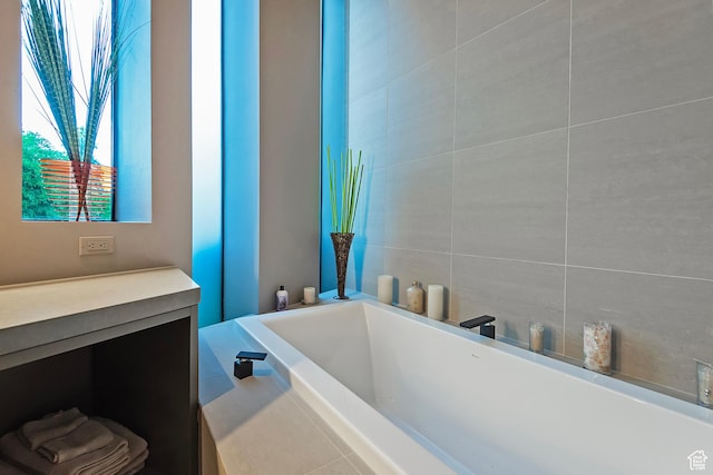 bathroom featuring a bath