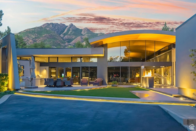 rear view of house with a mountain view