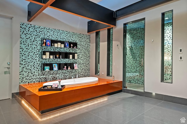 bathroom featuring a stall shower and tile patterned floors