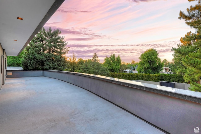 view of patio terrace at dusk