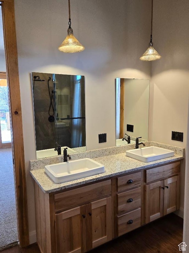 630 W 150 S, Torrey, UT 84775 - bathroom with double vanity and wood finished floors