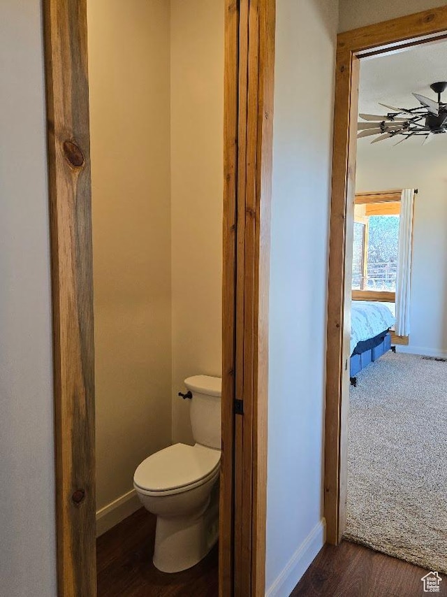630 W 150 S, Torrey, UT 84775 - bathroom featuring toilet, baseboards, a ceiling fan, and wood finished floors