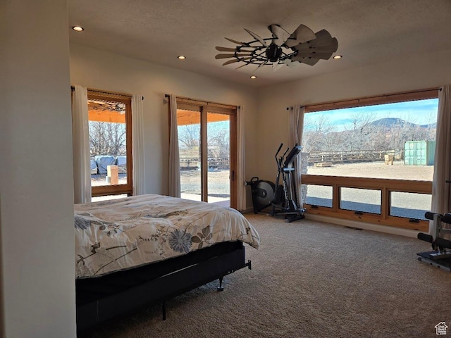 630 W 150 S, Torrey, UT 84775 - bedroom featuring access to outside, carpet, multiple windows, recessed lighting, and a mountain view
