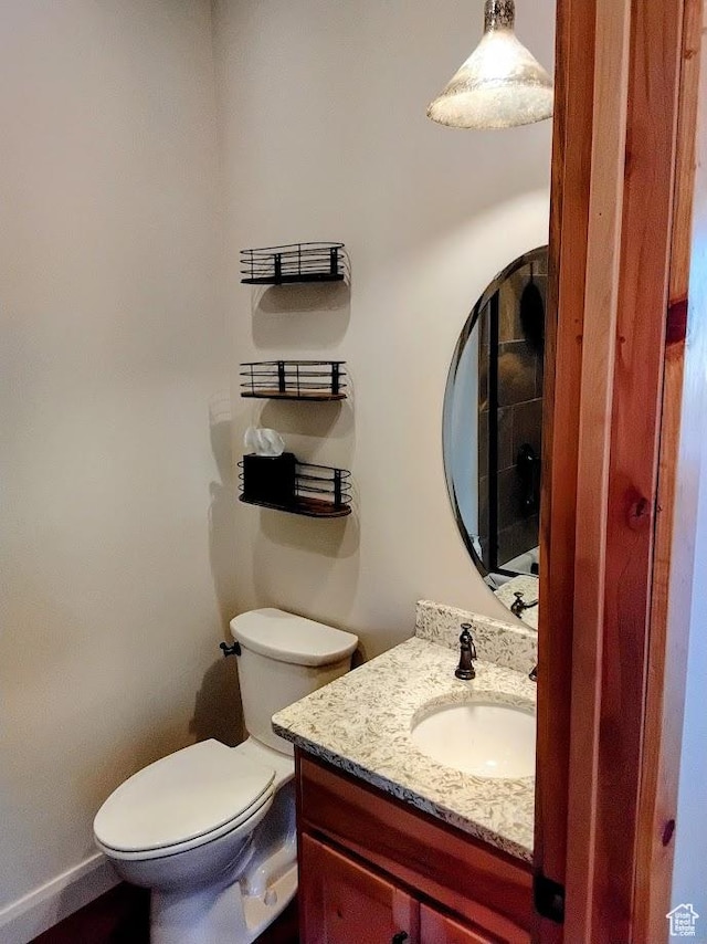 630 W 150 S, Torrey, UT 84775 - bathroom with vanity, toilet, and baseboards