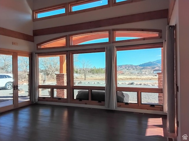 630 W 150 S, Torrey, UT 84775 - entryway featuring a mountain view, dark wood-type flooring, french doors, and healthy amount of natural light