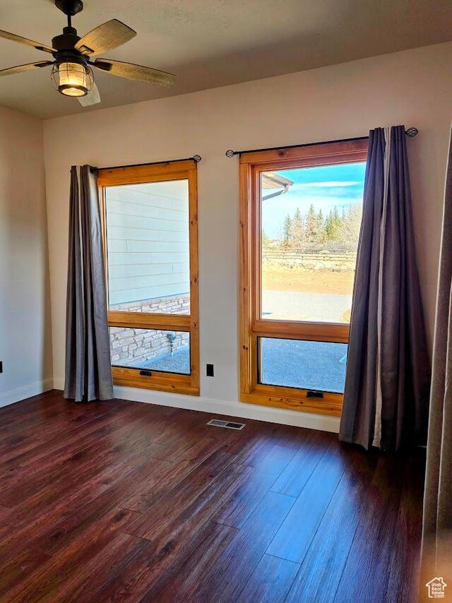 630 W 150 S, Torrey, UT 84775 - spare room with baseboards, dark wood-type flooring, and ceiling fan