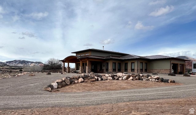 630 W 150 S, Torrey, UT 84775 - rear view of property featuring stone siding and metal roof
