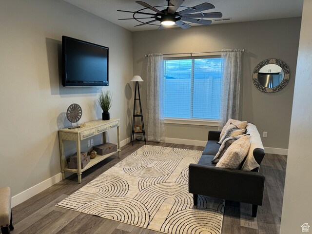169 E 700 N Unit 14, Ephraim, UT 84627 - living area featuring visible vents, baseboards, a ceiling fan, and wood finished floors