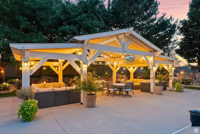 view of patio / terrace with an outdoor living space and a gazebo