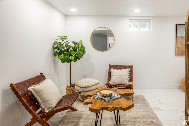 sitting room with tile patterned flooring