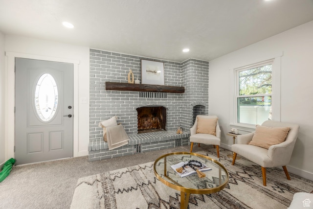 interior space featuring a fireplace and carpet floors