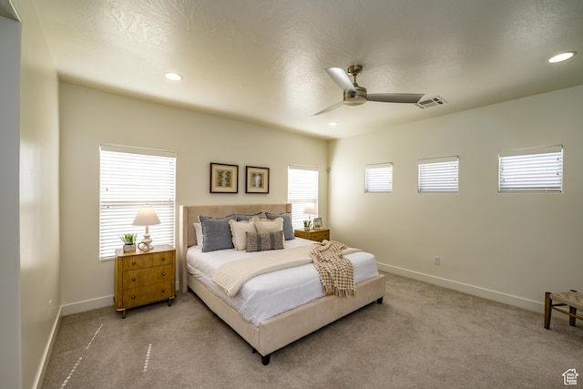 3385 S Marblewood Dr, St George, UT 84790 - carpeted bedroom with ceiling fan and multiple windows