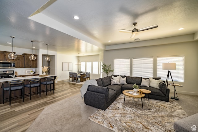 3385 S Marblewood Dr, St George, UT 84790 - living room with ceiling fan and light hardwood / wood-style floors