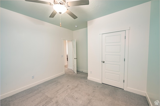 3385 S Marblewood Dr, St George, UT 84790 - unfurnished bedroom with a closet, ceiling fan, and light carpet