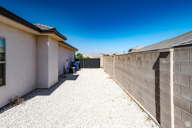 3385 S Marblewood Dr, St George, UT 84790 - view of yard featuring cooling unit and a patio
