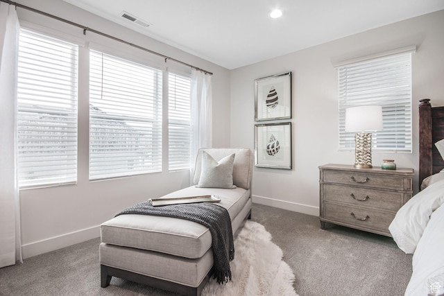 bedroom featuring carpet flooring, baseboards, and visible vents