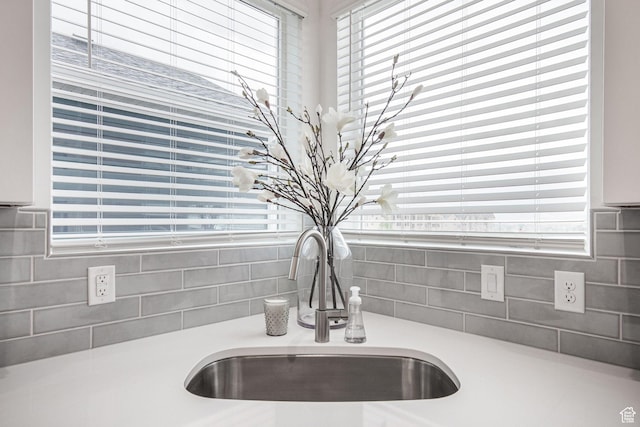 room details featuring a sink and light countertops