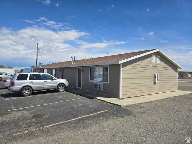 570 W Main St, Green River, UT 84525 - view of front of home with uncovered parking and a shingled roof