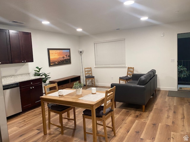 dining room featuring recessed lighting, visible vents, and light wood-type flooring