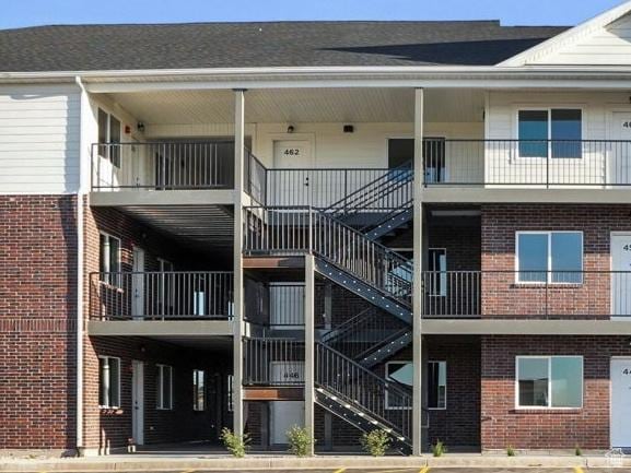 view of building exterior featuring stairs