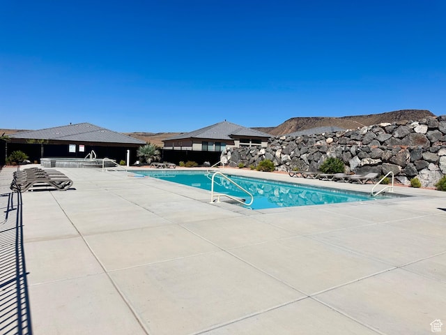 2128 N Montagna St, Washington, UT 84780 - pool with a patio and a mountain view