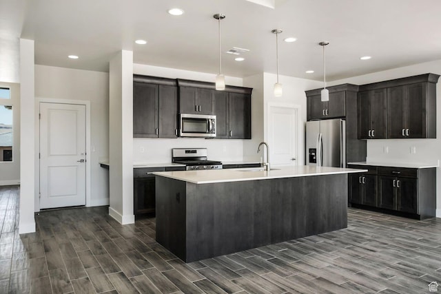2128 N Montagna St, Washington, UT 84780 - kitchen with stainless steel appliances, dark wood-style floors, visible vents, and a sink