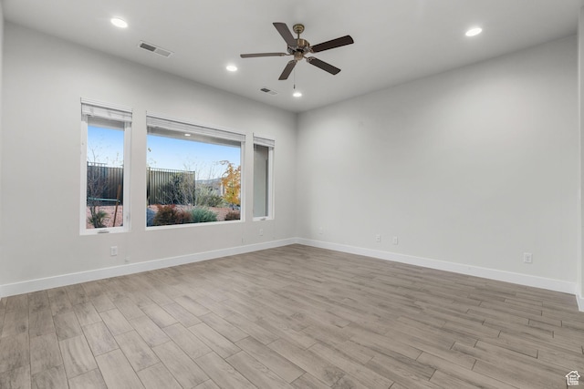 2128 N Montagna St, Washington, UT 84780 - empty room with visible vents, baseboards, a ceiling fan, and light wood finished floors