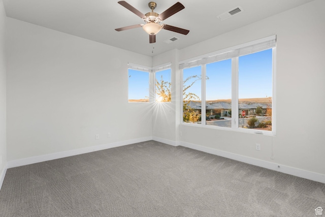 2128 N Montagna St, Washington, UT 84780 - carpeted spare room featuring ceiling fan, baseboards, and visible vents