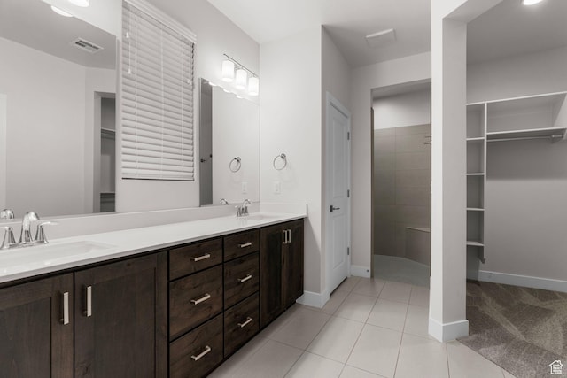 2128 N Montagna St, Washington, UT 84780 - full bath featuring visible vents, baseboards, and a sink