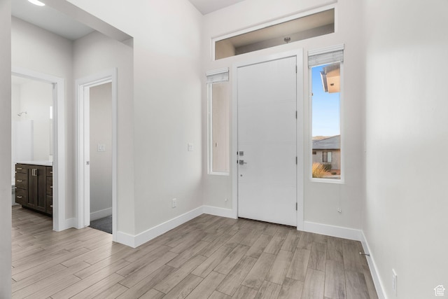2128 N Montagna St, Washington, UT 84780 - foyer featuring light wood-type flooring and baseboards