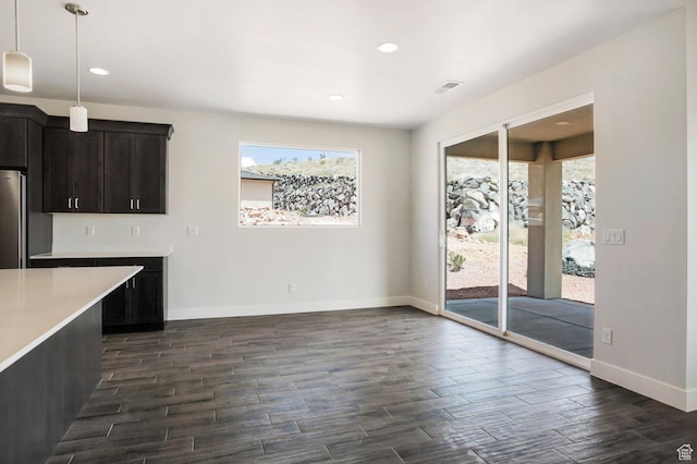 2128 N Montagna St, Washington, UT 84780 - unfurnished dining area with recessed lighting, dark wood-style floors, baseboards, and visible vents