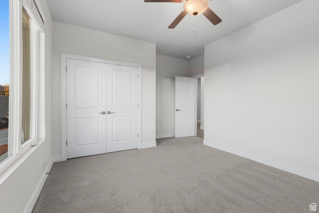 2128 N Montagna St, Washington, UT 84780 - unfurnished bedroom with a closet, carpet flooring, baseboards, and a ceiling fan