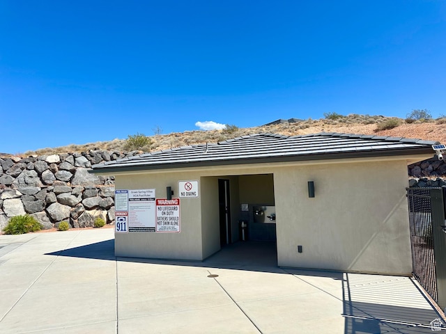 2128 N Montagna St, Washington, UT 84780 - exterior space featuring a tile roof and stucco siding