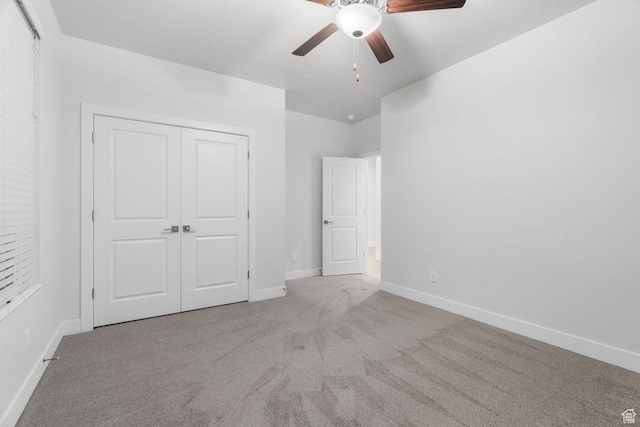 2128 N Montagna St, Washington, UT 84780 - unfurnished bedroom featuring a closet, baseboards, carpet flooring, and ceiling fan