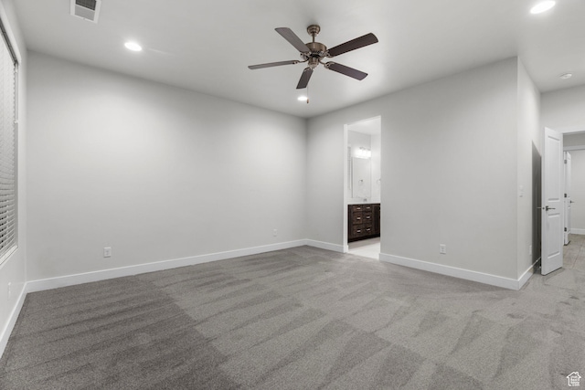 2128 N Montagna St, Washington, UT 84780 - unfurnished bedroom with ensuite bath, visible vents, recessed lighting, light carpet, and baseboards