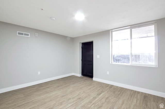 2745 Grant Ave, Ogden, UT 84401 - unfurnished room featuring baseboards, visible vents, and light wood-type flooring