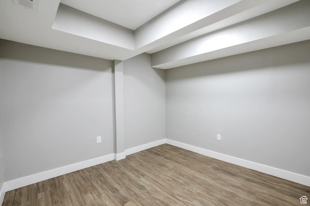 2745 Grant Ave, Ogden, UT 84401 - finished below grade area with baseboards, visible vents, and wood finished floors
