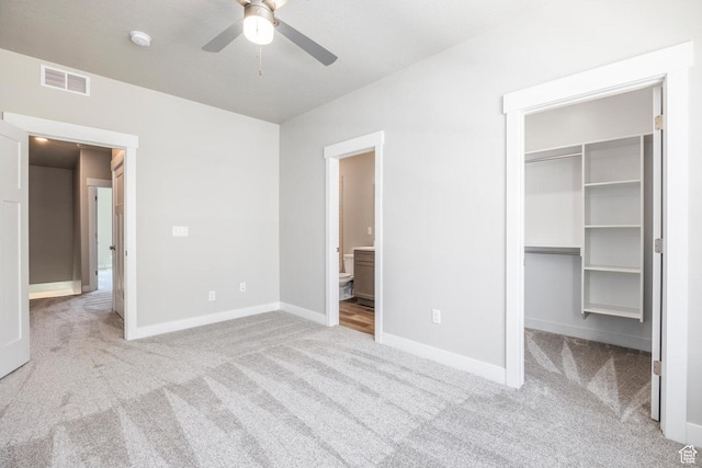 1082 S 2810 E, Spanish Fork, UT 84660 - unfurnished bedroom with visible vents, ensuite bathroom, baseboards, a spacious closet, and carpet