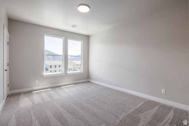 1082 S 2810 E, Spanish Fork, UT 84660 - spare room featuring baseboards and light colored carpet