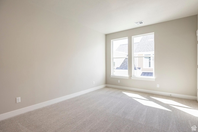 1082 S 2810 E, Spanish Fork, UT 84660 - unfurnished room featuring light carpet, baseboards, and visible vents
