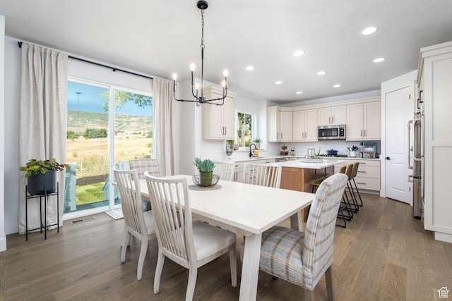 291 E 1980 N, Heber City, UT 84032 - dining room featuring recessed lighting, visible vents, a notable chandelier, and wood finished floors